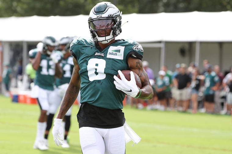 Rookie wide receiver DeVonta Smith makes a catch in his first practice since injuring his knee in late July.