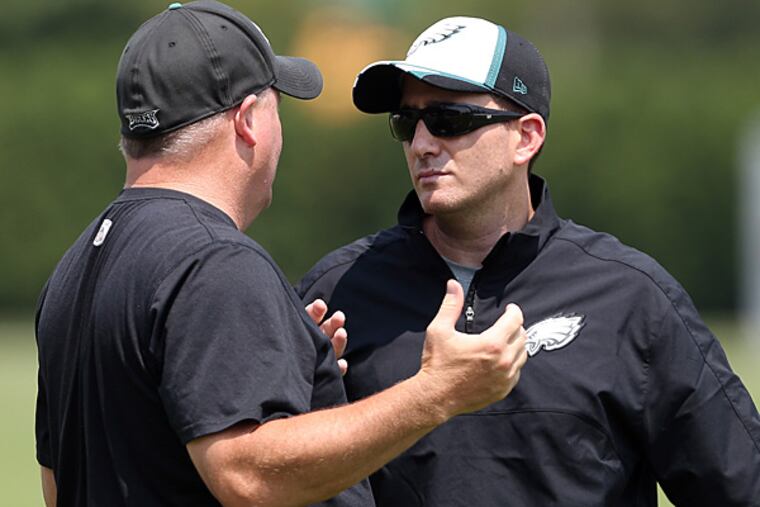 Eagles head coach Chip Kelly (left) and general manager Howie Roseman (right). (David Maialetti/Staff file photo)