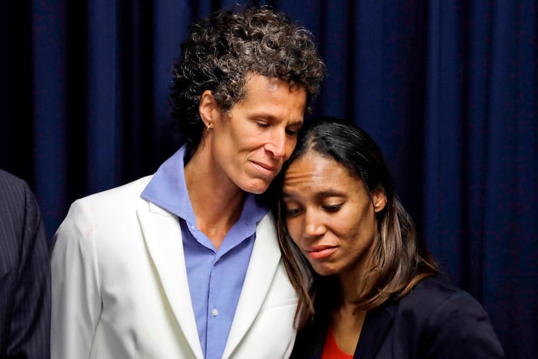 Bill Cosby accuser Andrea Constand, left, embraces prosecutor Kristen Feden during a news conference after Cosby was found guilty in his sexual assault retrial in Norristown, Pa., on April 26, 2018. Cosby's conviction was reversed on June 30, 2021, and the vast majority of the women who accused him of assault will not see their cases reach the courtroom.