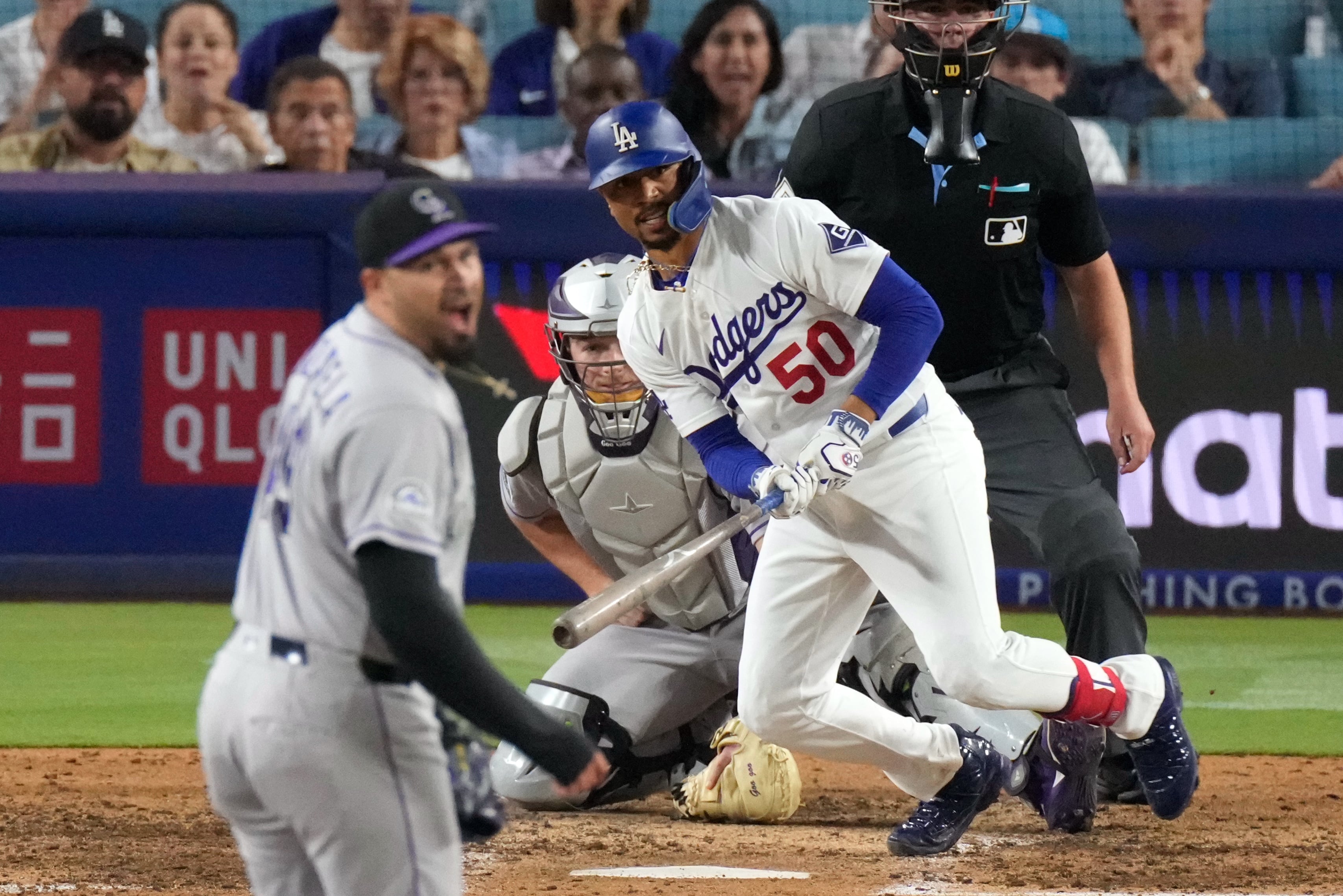 Mookie Betts delivers a clutch 2-strike hit in the eighth as Dodgers beat Rockies 4-3