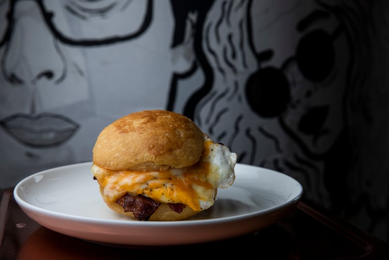 A bacon, egg, and cheese, breakfast sandwich on a brioche bun at Darnel’s Cakes at 444 North 3rd Street in 2022.