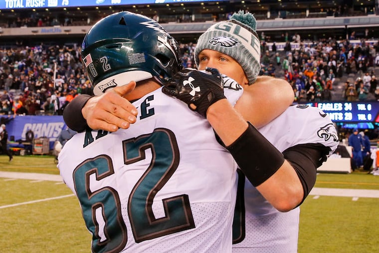 Everybody loves Nick Foles (right), who could be playing his final game as an Eagle on Sunday. A prohibitive contract for 2019 likely will have the Eagles looking elsewhere for Carson Wentz's backup. But there's still work to be done in 2018.