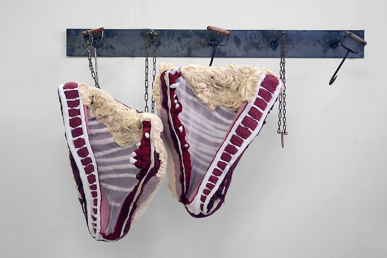 Tamara Kostianovsky, "Bound," (2008) is made of discarded clothing, metal hooks, and chain. The piece is on display as part of "Abundance/Excess: A Contemporary Eye on Still Life" at Brandywine Museum of Art.
