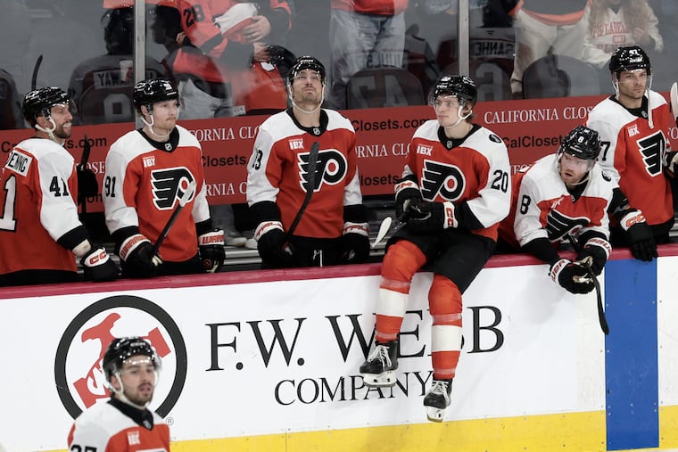 The Flyers bench looks on after a huge missed opportunity against Columbus on Tuesday at Xfinity Mobile Arena.