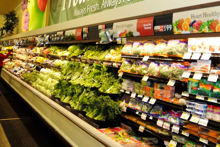 The fresh produce aisle at a supermarket.