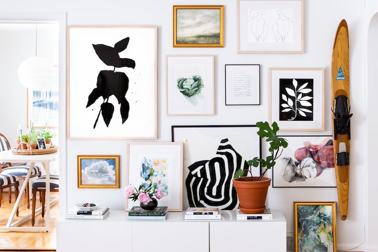An Artfully Walls gallery wall from a home in Ann Arbor, Michigan. “It’s not a trend. It’s been around for hundreds of years,” says the owner of an online framing company.