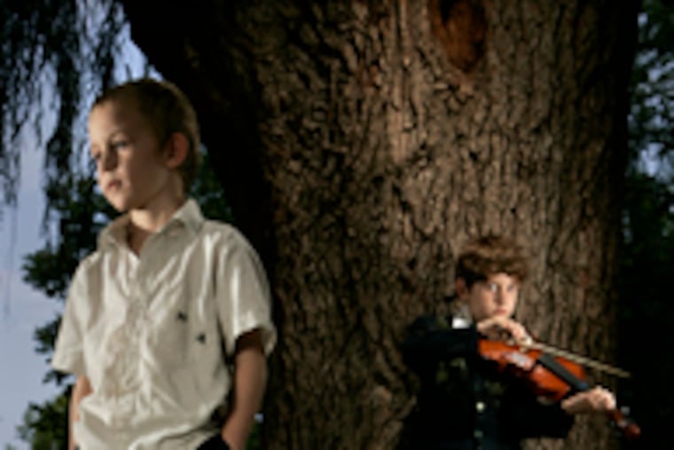 Holden Wilkins, 5, and brother Darius, 8, are the Hungarian Horntails, having a busy summer.