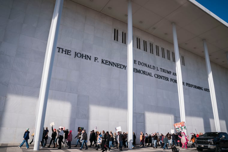 Protesters gather in front of the John F. Kennedy Center for the Performing Arts after President Donald Trump’s name was added to the facade on Dec. 20 in Washington.