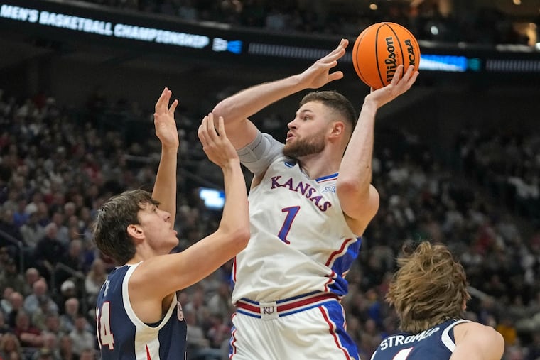 Kansas center Hunter Dickinson shoots as Gonzaga forward Braden Huff guards him during an NCAA Tournament on March 23.