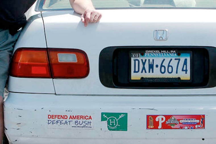 "It's free speech," Robert Lawley, 59, says of his bumper stickers. He has one that says "Defend America. Defeat Bush." (AKIRA SUWA / Staff Photographer)
