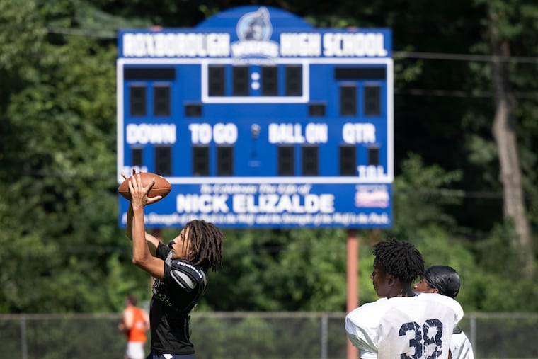 Roxborough High School football players took part in a recent practice at their stadium, which is now named for Nick Elizalde, the 14-year-old who was shot and killed in 2022 following a scrimmage.
