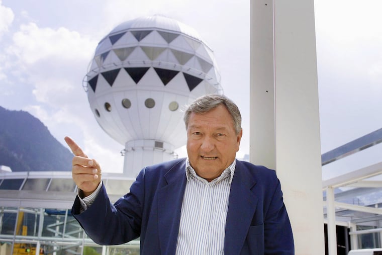 Erich von Daeniken, co-founder and co-owner of Mystery Park, poses in front of the Panorama Tower at the park in Interlaken, Wednesday, April 23, 2003.