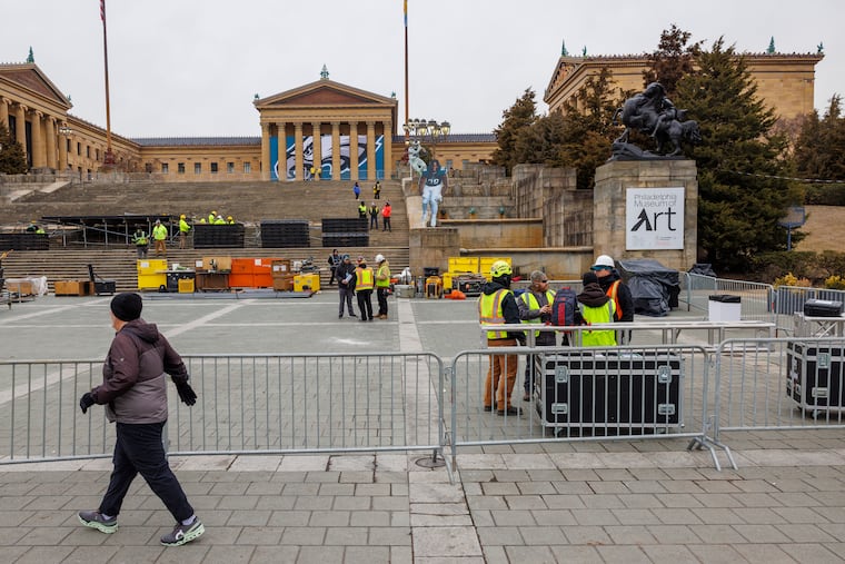 Work crews prepare the steps at the Philadelphia Museum of Art for the upcoming Eagles Super Bowl victory parade, Tuesday, Feb. 11, 2025.