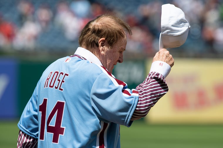 First Phillies world championship team player, Pete Rose, salutes the fans on Sunday, August 7, during a Phillies Alumni Day festivities at Citizens Bank Park.