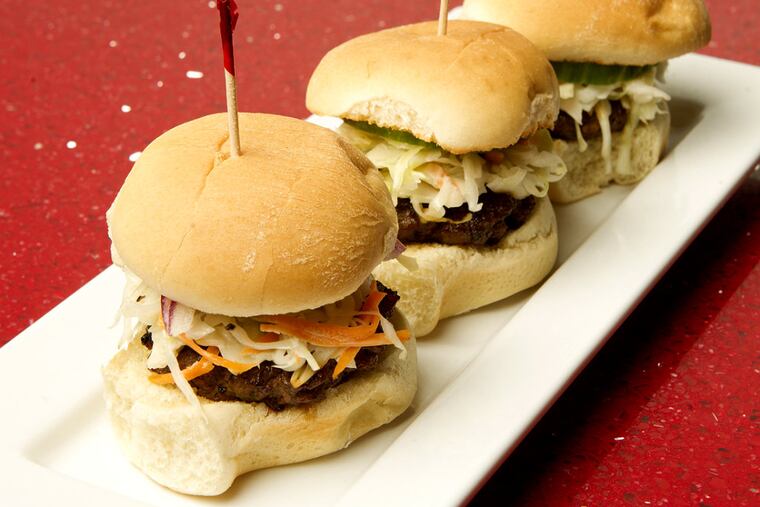 The bulgogi beef sliders at Bonchon were drowned in mayo. (Charles Fox/Staff Photographer)