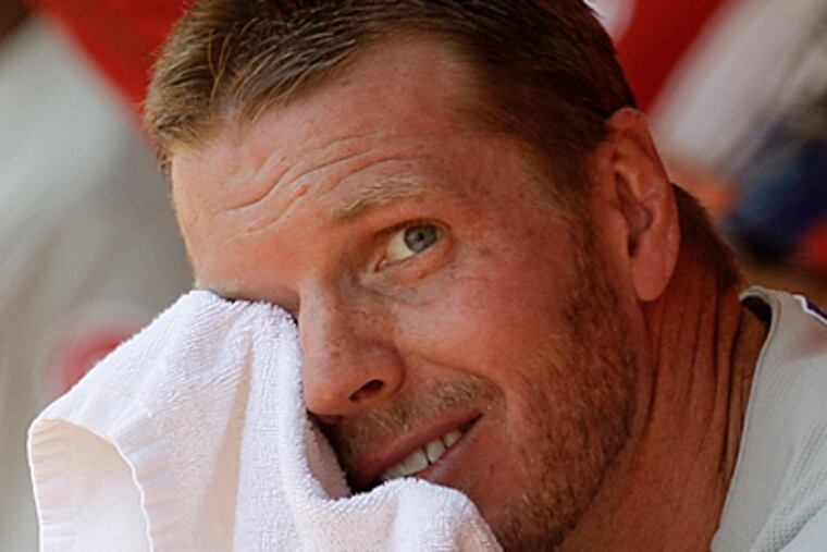 Roy Halladay's performance yesterday was not enough to top the Reds, as the Phillies lost, 4-3. (AP Photo/Al Behrman)