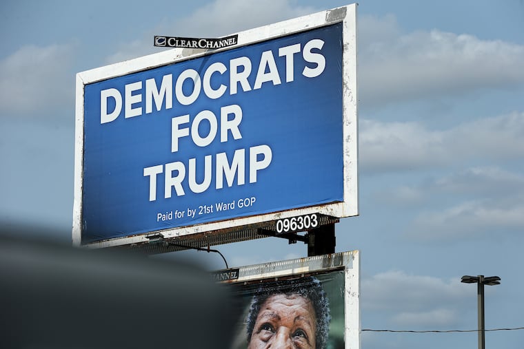 A billboard that reads "Democrats for Trump" is visible along the 5700 block of Ridge Avenue in Philadelphia, Pa. on September 16, 2020. The political disclaimer says it was paid for by the 21st Ward GOP but the ward leader there says he knows nothing about it.