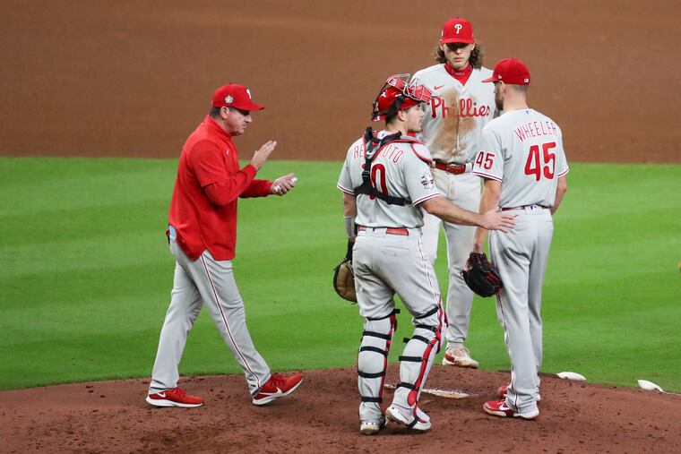 Phillies manager Rob Thomson walks out to pull starting pitcher Zack Wheeler in the bottom of the sixth inning in Game 6.