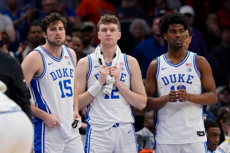 TJ Power (center) played his freshman year at Duke then transferred to Virginia this past season.