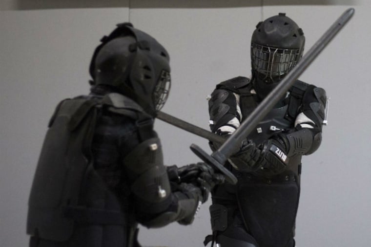 Old friends, there for a bachelor party, fight each other at Battlesword League, a new sport based in Port Richmond.