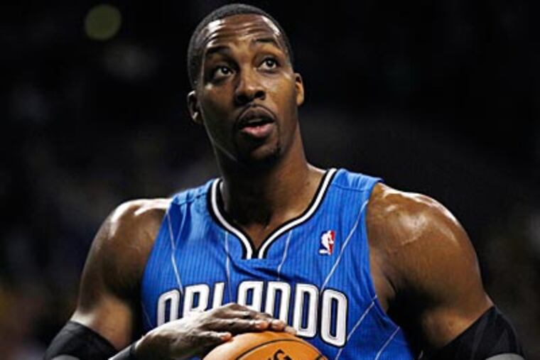 Dwight Howard has made it clear that he wants to continue his career in New York or L.A. (Charles Krupa/AP)
