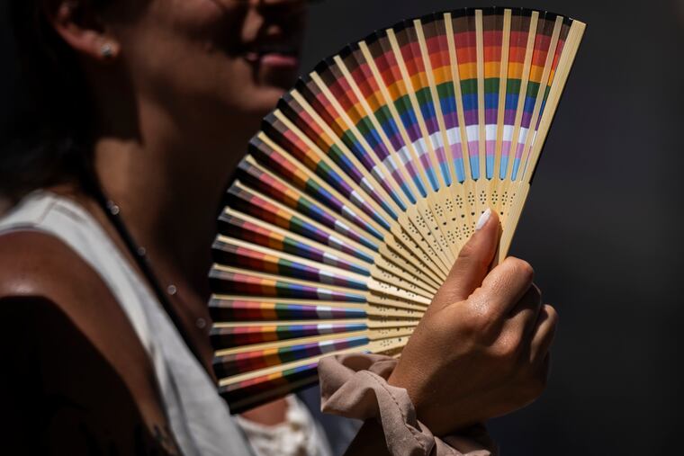 A woman fans herself in Madrid. July has been so hot so far that scientists calculate that this month will be the hottest globally on record and likely the warmest human civilization has seen, even though there are several days left to sweat.