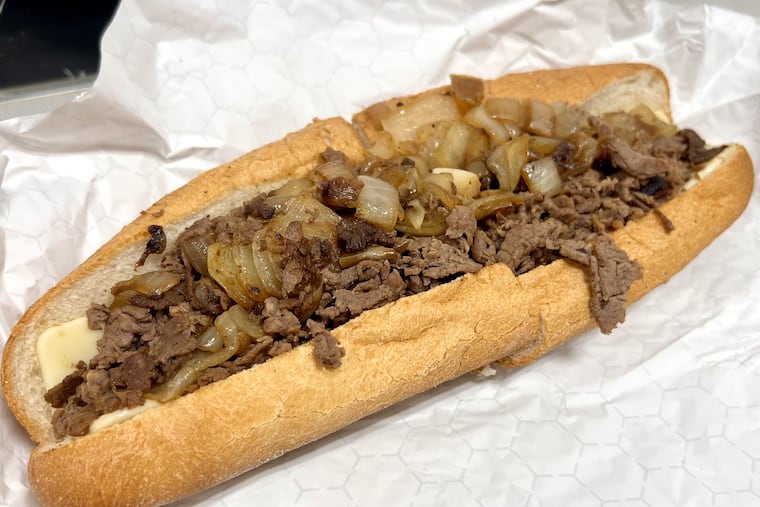 A cheesesteak with fried onions and Cooper sharp cheese at Jim's West, 431 N. 62nd St.