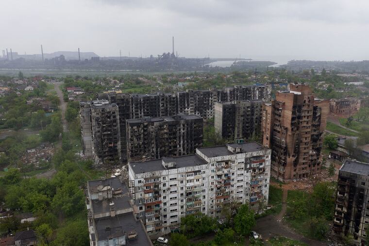 An aerial view of damaged residential buildings and the Azovstal steel plant in the background in the port city of Mariupol on Wednesday.