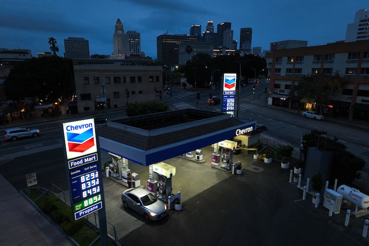 Gas prices are displayed at a Chevron gas station, in downtown Los Angeles, Tuesday, March 31, 2026.
