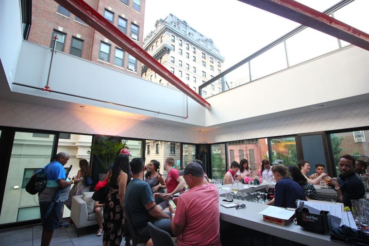 The roof is retracted at Maison 208, the stylish bar/restaurant at 208 S. 13th St. MICHAEL KLEIN / Staff