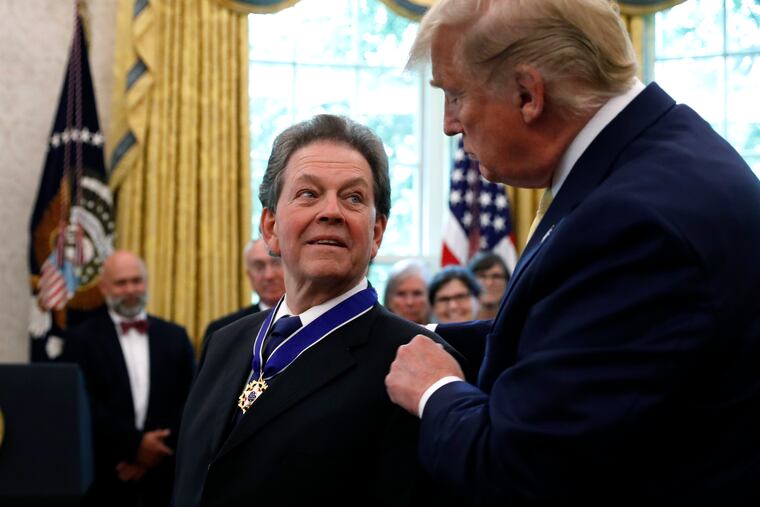 President Donald Trump awards the Presidential Medal of Freedom to economist Arthur Laffer, Wednesday June 19, 2019, in the Oval Office of the White House in Washington. (AP Photo/Jacquelyn Martin)