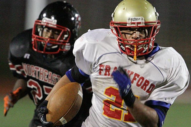 Frankford's Alex Candelario out runs Northeast's Asa Manley during the
fourth quarter.(Steven M. Falk/Staff Photographer)