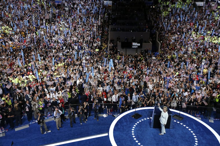 Hillary Clinton waves before giving her address during the DNC in Philadelphia.