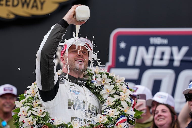 Felix Rosenqvist, of Sweden, celebrates after winning the Indianapolis 500 auto race at Indianapolis Motor Speedway in Indianapolis, Sunday, May 24, 2026. (AP Photo/Michael Conroy)