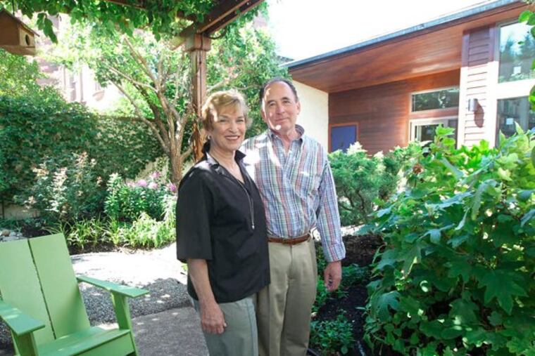 Marsha Weinraub and Stuart Schmidt rehabbed a rental property on 22d Street in Spring Garden that included a barbershop and three disused oil tanks. (Michael Bryant / Staff Photographer)