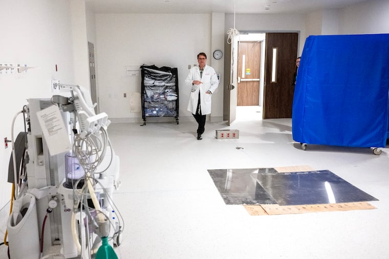Medical director Richard Borge of AMS Cardiology Surgery Center in Horsham in February walks through a room intended for cardiac ablations. Cardiovascular surgery centers will be able to take advantage of an insurance effort to move care out of hospitals into lower-cost settings.