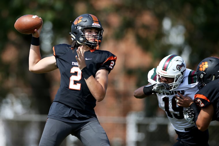 Woodrow Wilson's Devin Kargman (2) threw for 255 yards and four touchdowns to lead Woodrow Wilson to a 53-34 shootout win over Seneca on Saturday.
