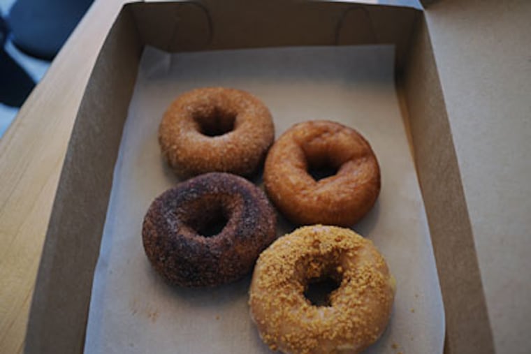The doughnuts: (Clockwise from left): Appolonia, Chile Lime, Honey Glazed, Key Lime. (SARAH J. GLOVER / Staff Photographer)