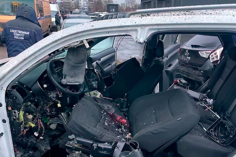 This image taken from video provided by Investigative Committee of Moscow on Monday, Dec. 22, 2025, shows the scene where Lt. Gen. Fanil Sarvarov, head of the Operational Training Directorate of the Russian Armed Forces General Staff, was killed by an explosive device placed under his car in Moscow.