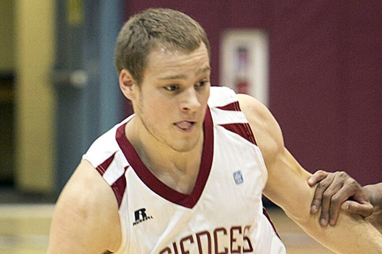 Garret Kerr set school records by averaging 24.8 points and 12.5 rebounds for University of the Sciences. (Handout photo)