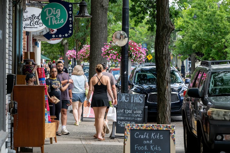 Pedestrians in downtown Collingswood on Father's Day, Sunday, June 21, 2026.