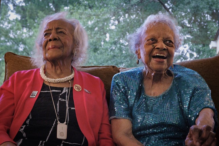 Velma Long (left) and Dorothy Boggess in Boggess’s home in Washington last week. (Tyler M. Andrews/The Washington Post)