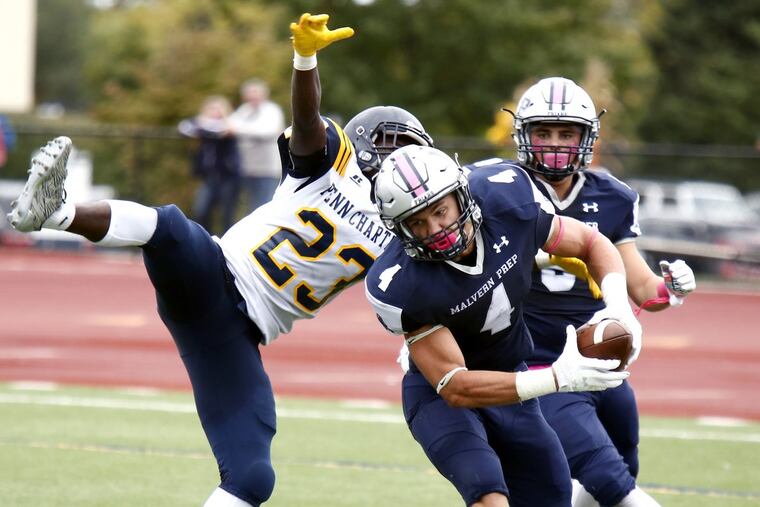 Malvern Prep linebacker Keith Maguire makes an interception in a 23-9 victory over Inter-Ac League rival Penn Charter on Oct. 14.