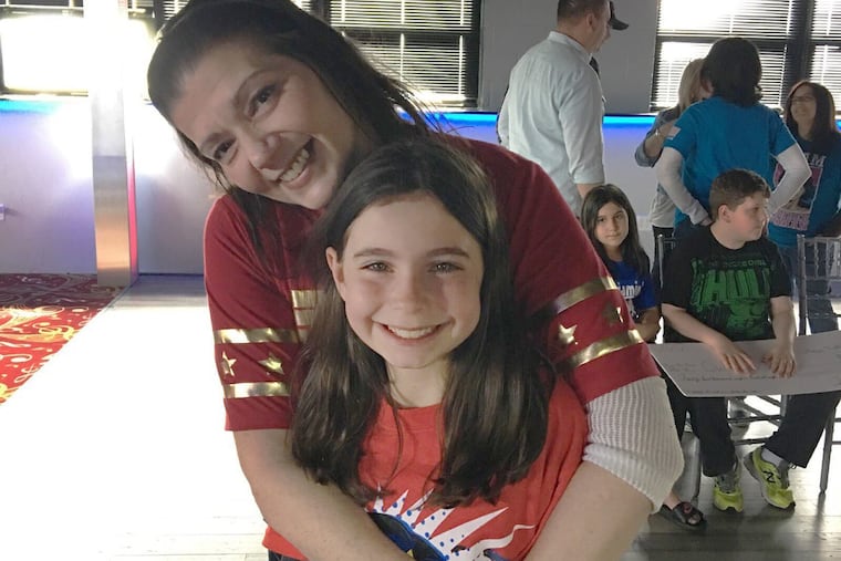 A file photo of Traci DiStefano, who died of ovarian cancer, with Casey Stone, the teen who helped raise money in her honor.