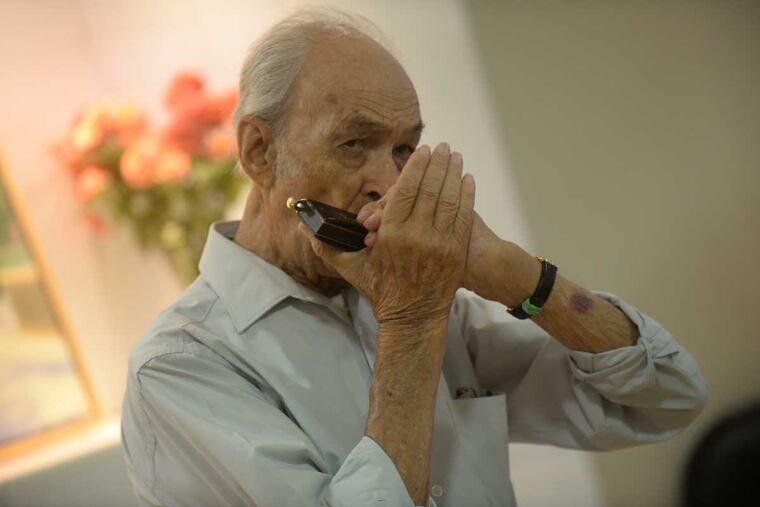 For an encore, Harry Azoff pulled out his harmonica and treated the crowd to a blues song.