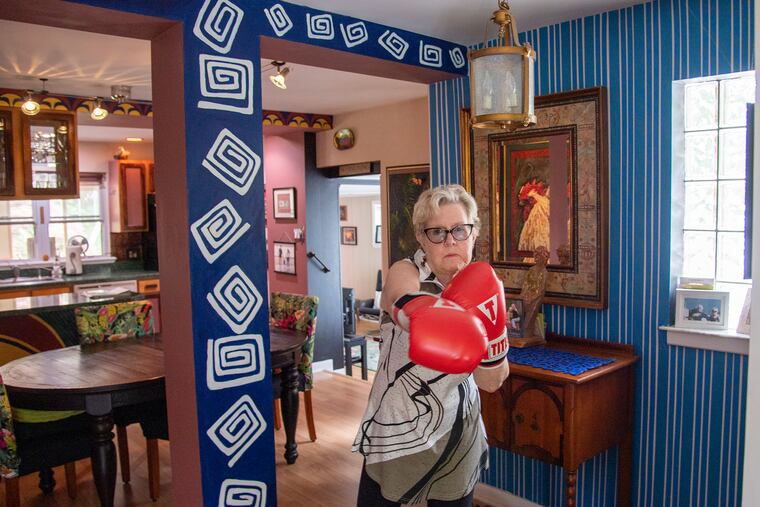 Boxing is part of Bonnie Queen's physical therapy for Parkinson's disease. She's an artist who has filled her home with color and design.