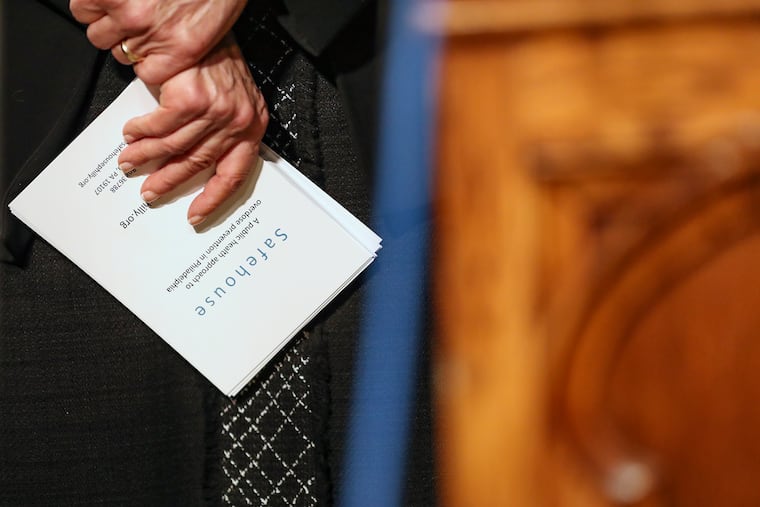 Ronda Goldfein of Safehouse holds notes during a news conference in 2020.
