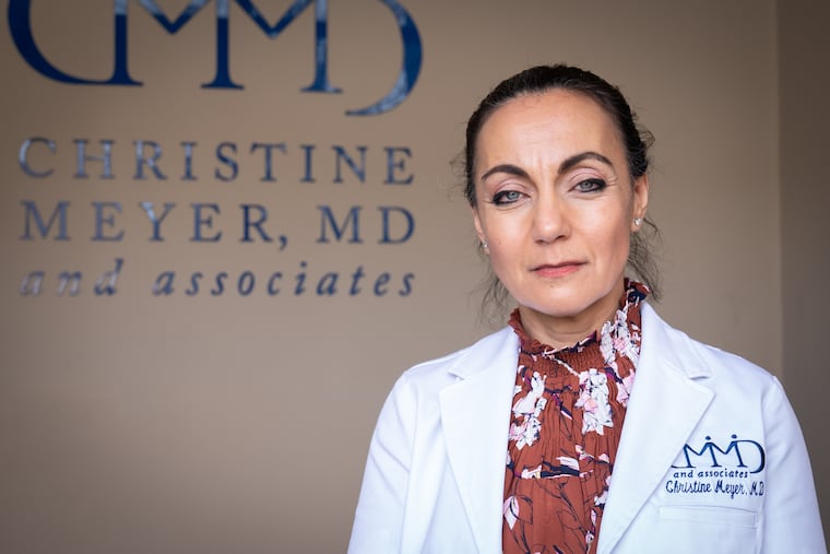Physician Christine Meyer shown here in her office in Exton.
