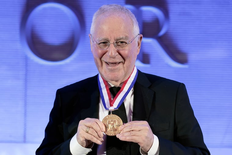 Ron Chernow (author of the biography on which 'Hamilton' the musical is based) shows off the 2025 Liberty Medal he was awarded at National Constitution Center in Philadelphia on Friday, Oct. 17, 2025.