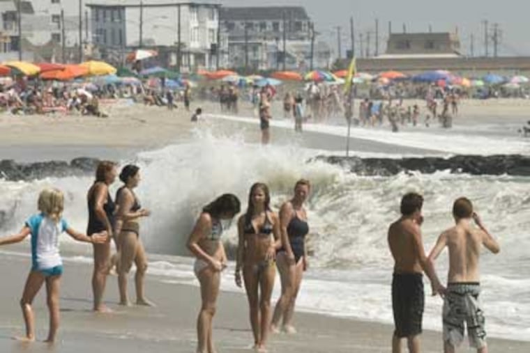 Higher-than-usual waves on the Cape May beaches kicked up from approaching Hurricane Earl yesterday. Earl is expected to pass the Jersey Shore Friday. (Ron Tarver / Staff Photographer)